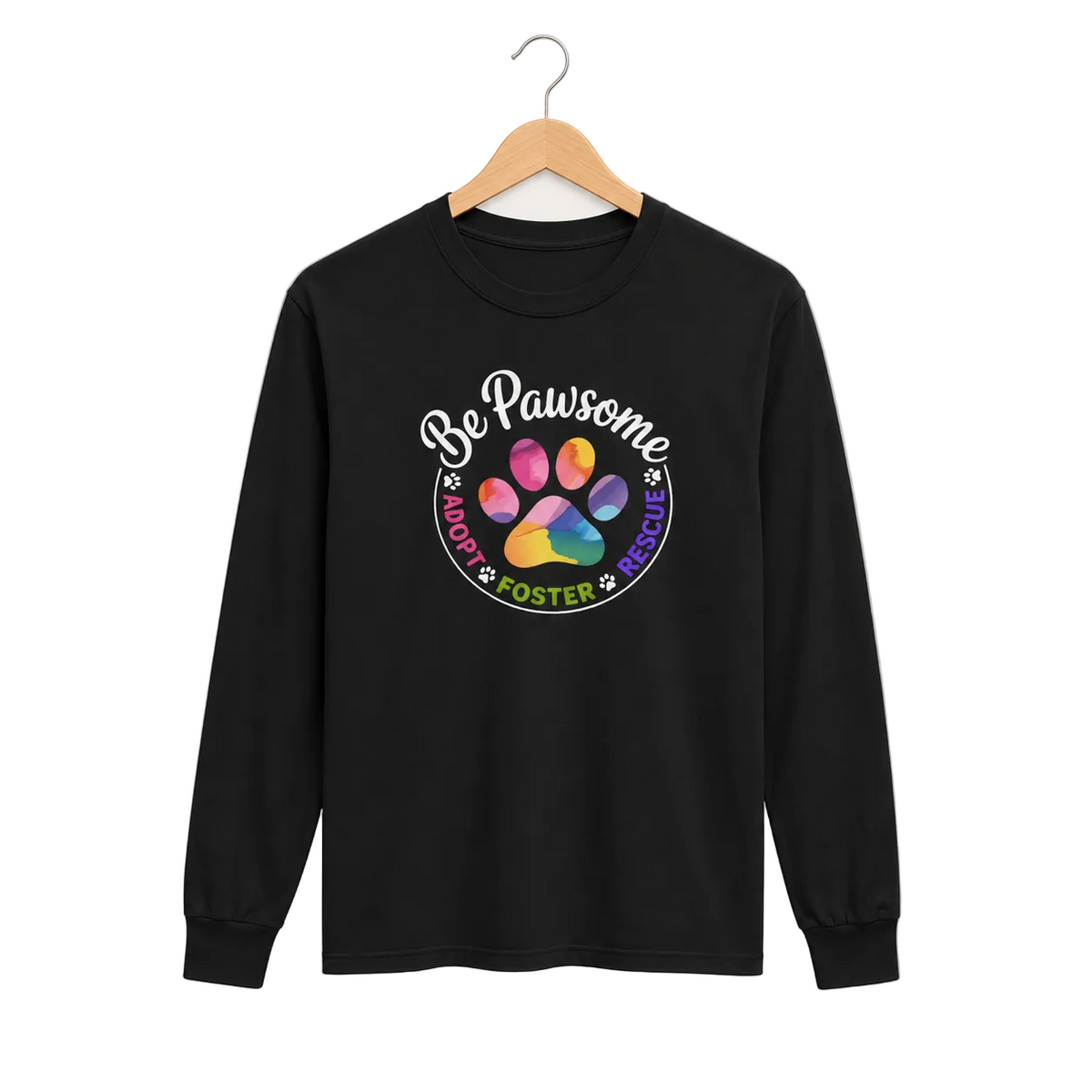 Black long sleeve cat rescue shirt with a colorful paw print graphic and text 'Be Pawsome Adopt Foster Rescue'.