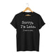 Black unisex graphic t-shirt with 'SORRY I'M LATE. I SAW A CAT' text for cat lovers.