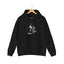 A black hoodie hanging on a wooden hanger against a white background, with the text 'The F*ck You Lookin’ At?'.
