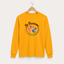 Gold yellow long sleeve cat rescue shirt with a colorful paw print graphic and text 'Be Pawsome Adopt Foster Rescue'.