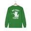 An irish green long-sleeve t-shirt featuring a white graphic print of a cat holding a small arrow, with the text 'NOT TODAY CUPID' arched above and below the illustration.