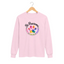 Light pink long sleeve cat rescue shirt with a colorful paw print graphic and text 'Be Pawsome Adopt Foster Rescue'.