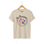 Sand cat rescue t-shirt featuring a rainbow paw print graphic with text 'Be Pawsome Adopt Foster Rescue'.