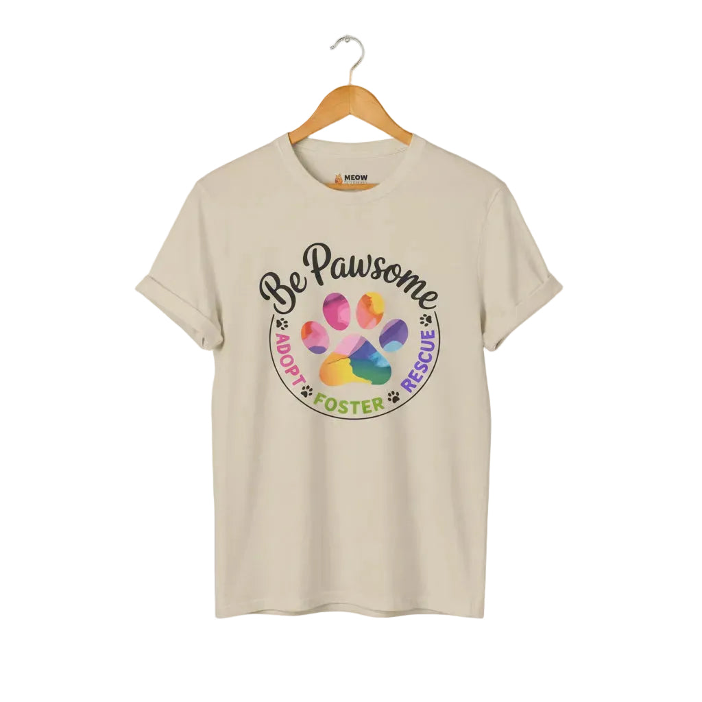 Sand cat rescue t-shirt featuring a rainbow paw print graphic with text 'Be Pawsome Adopt Foster Rescue'.