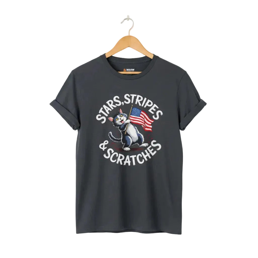 Dark heather unisex short-sleeve t-shirt with a graphic of a cartoon cat holding an American flag and the text 'STARS, STRIPES & SCRATCHES'.