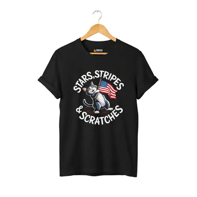 Black unisex short-sleeve t-shirt with a graphic of a cartoon cat holding an American flag and the text 'STARS, STRIPES & SCRATCHES'.