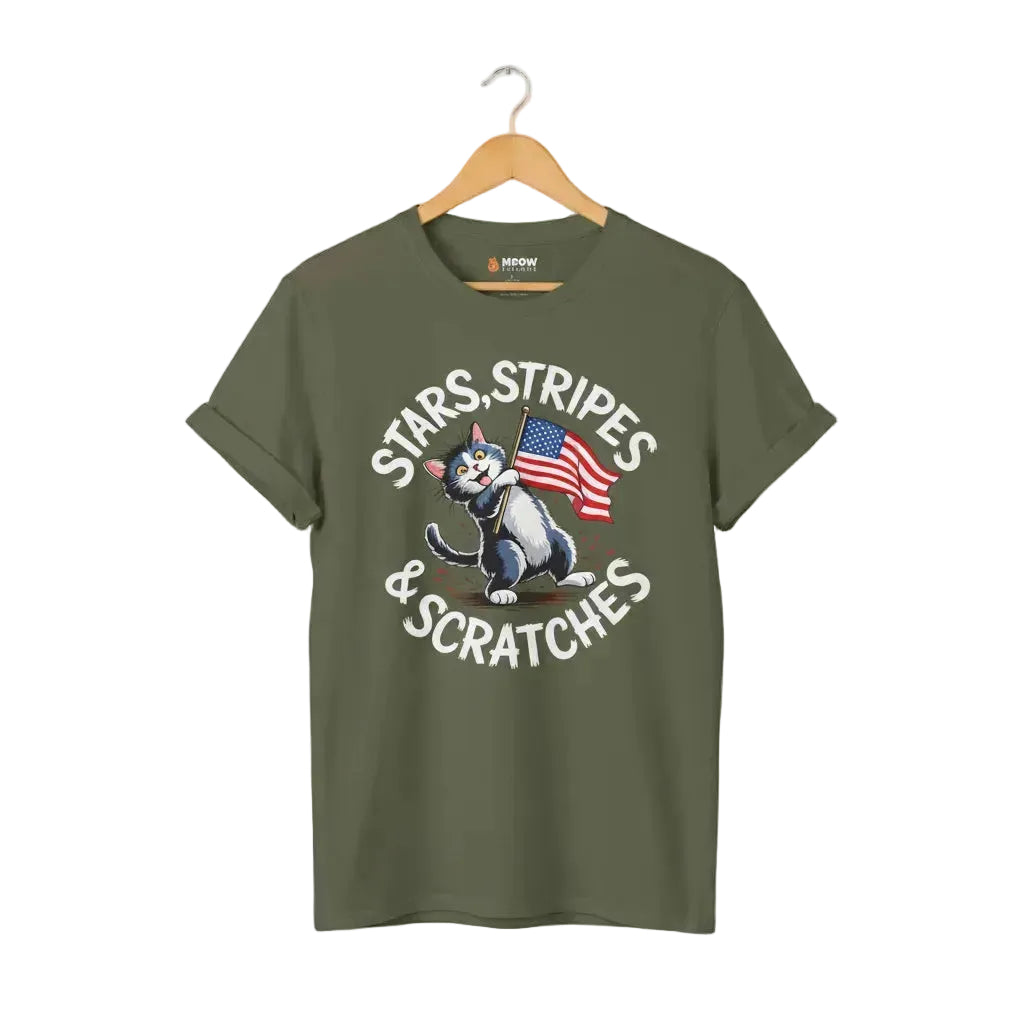 Military green unisex short-sleeve t-shirt with a graphic of a cartoon cat holding an American flag and the text 'STARS, STRIPES & SCRATCHES'.