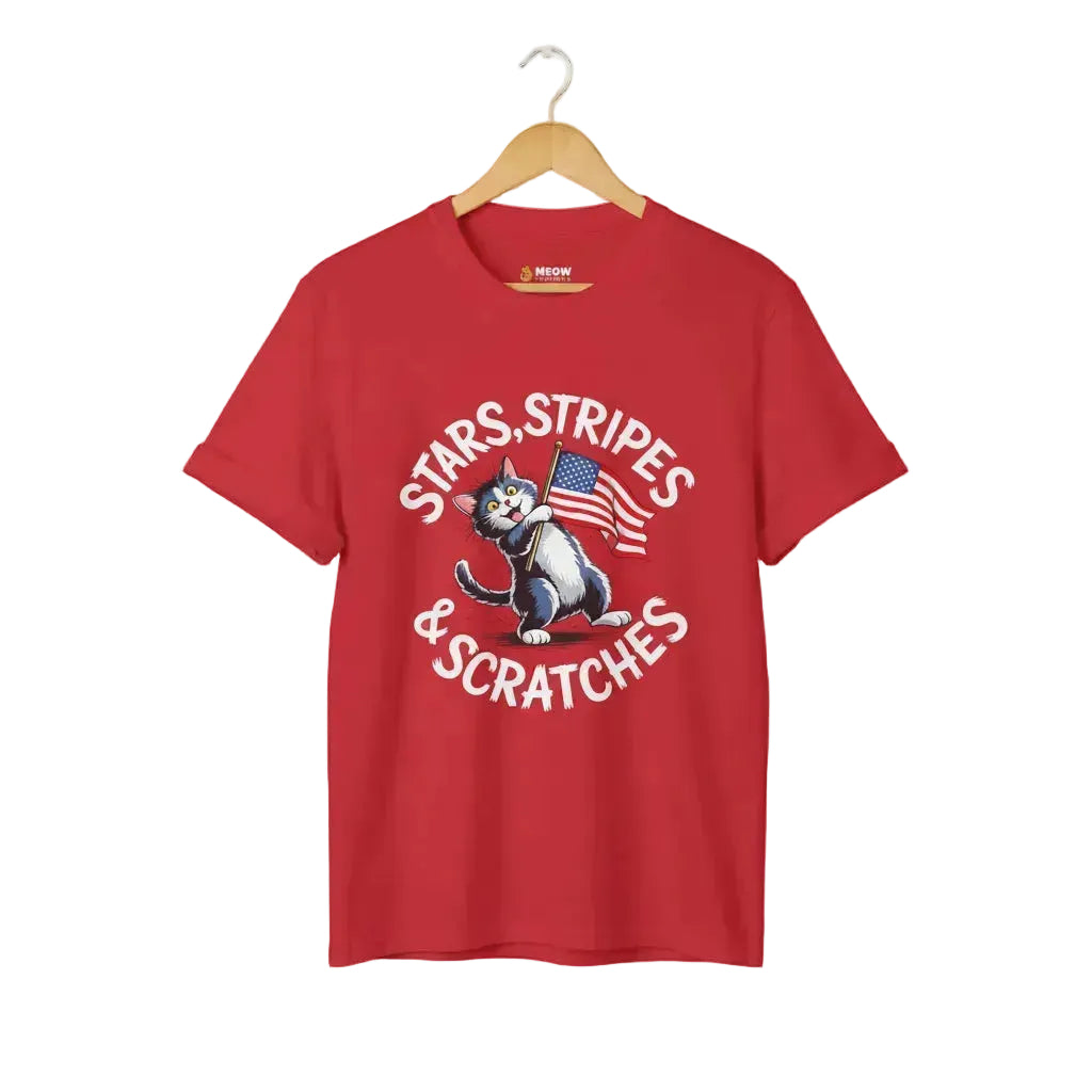 Red unisex short-sleeve t-shirt with a graphic of a cartoon cat holding an American flag and the text 'STARS, STRIPES & SCRATCHES'.