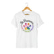 White cat rescue t-shirt featuring a rainbow paw print graphic with text 'Be Pawsome Adopt Foster Rescue'.